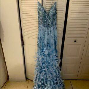Andrea and Leo Couture gown size 4 with beautiful sequin, feather and glitter.